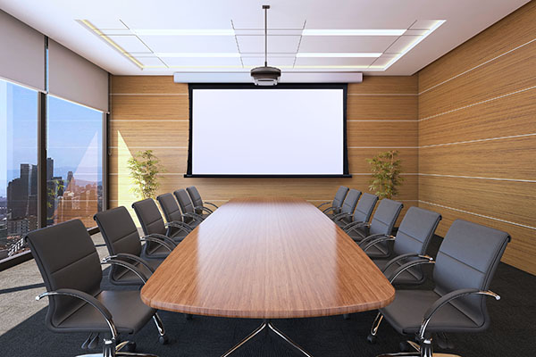 Acumen V projector screen in a high rise conference room